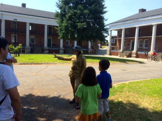 Val leading a tour within Fort Jay