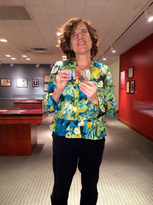 Ernst Bacharach's granddaughter shows the medals he earned during the Great War. Bacharach came to the United States at the start of the Second World War.