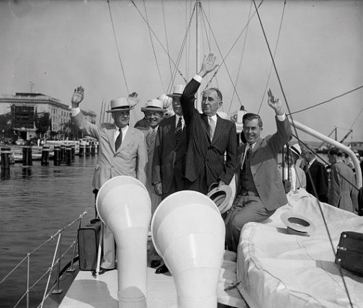 Annapolis, Maryland, 25 June 1937: Congressional and Cabinet leadership boards to meet FDR at the Jefferson Island Democratic Club, left to right: House Majority Leader Sam Rayburn, Secretary of War Harry H. Woodring; Secretary of State Cordell Hull; Speaker of the House William B. Bankhead; and Secretary of Agriculture Henry A. Wallace